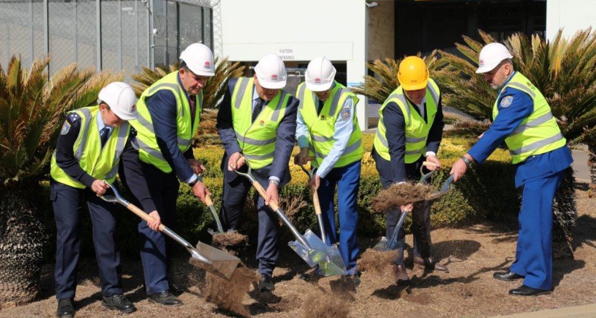 Turning the first sod outside the Geoffry Pearce Correctional Centre, part of the Francis Greenway complex.