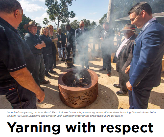 People standing around the yarning circle at Brush Farm Academy.