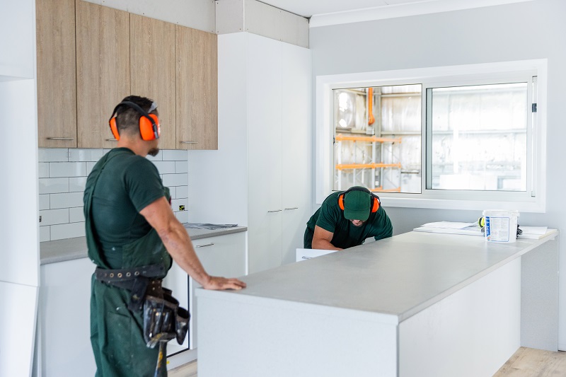 Men building a kitchen