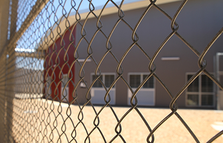 Macquarie_CC_fence Part of the new Macquarie Correctional Centre on the day before opening.